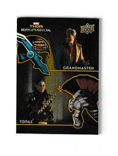 Load image into Gallery viewer, 2013 Thor Ragnarok Armory Dual Memorabilia #AD-6 Grandmaster &amp; Topaz
